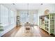 Charming dining room with wainscoting, a chandelier, and natural light at 1588 Paradise Lake Dr, Mount Pleasant, SC 29464