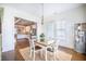 Bright dining room with an open view to the kitchen, perfect for entertaining at 1588 Paradise Lake Dr, Mount Pleasant, SC 29464