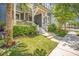 Inviting porch with stylish stairs and lush greenery, leading to a charming blue two-story home at 1588 Paradise Lake Dr, Mount Pleasant, SC 29464