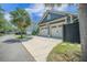 Detached two car garage with carriage doors and a private driveway at 1588 Paradise Lake Dr, Mount Pleasant, SC 29464