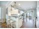 Modern kitchen featuring white cabinets, granite countertops, and stainless steel appliances at 1588 Paradise Lake Dr, Mount Pleasant, SC 29464