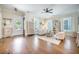 Bright and airy living room with hardwood floors, neutral tones, and stylish furnishings at 1588 Paradise Lake Dr, Mount Pleasant, SC 29464