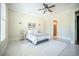 Inviting main bedroom featuring a ceiling fan, natural light, and calming decor at 1588 Paradise Lake Dr, Mount Pleasant, SC 29464