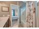 Bathroom with vanity, shower-tub, and adjacent bedroom view at 1589 Seabago Dr, Charleston, SC 29414