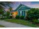 Beautiful single-Gathering home with manicured lawn, flowering bushes and a cozy porch setting at 1589 Seabago Dr, Charleston, SC 29414