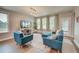 Bright living room featuring comfortable seating, large windows, and stylish decor at 1589 Seabago Dr, Charleston, SC 29414