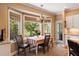 Breakfast nook features a bay window and a chandelier at 16 Fairway Village Ln, Isle of Palms, SC 29451
