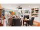 Comfortable living room featuring a fireplace, built-in shelving, and natural light at 16 Fairway Village Ln, Isle of Palms, SC 29451