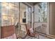 Private outdoor balcony with cozy patio seating and sliding glass door to living space at 1600 Long Grove Dr # 1512, Mount Pleasant, SC 29464