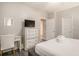 Brightly-lit bedroom with a TV, desk and comfortable bed at 1600 Long Grove Dr # 1512, Mount Pleasant, SC 29464