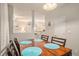 A dining room featuring a dark wooden table with seating for four at 1600 Long Grove Dr # 1512, Mount Pleasant, SC 29464