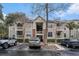 Exterior of complex shows multiple units with central entrance and parking at 1600 Long Grove Dr # 1512, Mount Pleasant, SC 29464