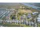 Aerial view of waterfront community with houses, pools, docks, and scenic water views at 1647 Marsh Harbor Ln, Mount Pleasant, SC 29464