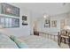 Upstairs bedroom with ceiling fan, a TV, coastal wall decor, an ornate bed frame, and carpeted floor at 1647 Marsh Harbor Ln, Mount Pleasant, SC 29464