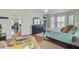 Comfortable bedroom featuring neutral walls, natural light, and cozy seating at 1647 Marsh Harbor Ln, Mount Pleasant, SC 29464