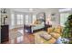 Bright bedroom featuring natural light, four-poster bed, and comfortable seating at 1647 Marsh Harbor Ln, Mount Pleasant, SC 29464