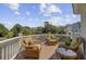 Outdoor deck with comfortable wicker seating and scenic treetop views at 1647 Marsh Harbor Ln, Mount Pleasant, SC 29464