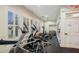 Bright home gym equipped with modern equipment and ample space for a complete workout routine at 1647 Marsh Harbor Ln, Mount Pleasant, SC 29464