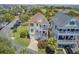 Charming two-story house with balconies, surrounded by lush greenery and well-maintained landscaping at 1647 Marsh Harbor Ln, Mount Pleasant, SC 29464