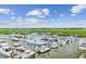 Picturesque marina with numerous boats docked, offering stunning views and easy access to coastal waterways at 1647 Marsh Harbor Ln, Mount Pleasant, SC 29464
