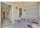Inviting outdoor porch with comfortable seating, perfect for relaxing and enjoying the coastal ambiance at 1647 Marsh Harbor Ln, Mount Pleasant, SC 29464