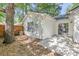 Backyard featuring a large mature tree, vinyl siding and a concrete patio at 1705 Bassett Ct, Charleston, SC 29412