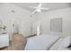 Bright bedroom featuring a ceiling fan and ample closet space, ideal for rest and relaxation at 1705 Bassett Ct, Charleston, SC 29412