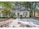 Charming single-story home with a well-manicured lawn, inviting entrance, and lovely curb appeal at 1705 Bassett Ct, Charleston, SC 29412