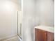 Bathroom showcasing a glass-enclosed shower and a dark wood vanity with a white countertop at 1713 Pimlico Blvd, Moncks Corner, SC 29461