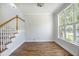 Empty bonus room with wood floors and large windows, great for an office, playroom or extra space at 1713 Pimlico Blvd, Moncks Corner, SC 29461