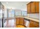 Spacious kitchen with stainless appliances and granite countertops overlooking the dining area and water views at 1713 Pimlico Blvd, Moncks Corner, SC 29461