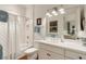 Bright bathroom featuring white fixtures, a shower-tub combo, and stylish decorations around the vanity at 18 Fernandina St, Mount Pleasant, SC 29464