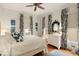 Comfortable bedroom with hardwood floors, neutral walls, and custom window treatments at 18 Fernandina St, Mount Pleasant, SC 29464