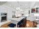 Bright modern kitchen featuring a large island, stainless steel appliances, and custom cabinetry at 18 Fernandina St, Mount Pleasant, SC 29464
