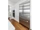 Gourmet kitchen featuring stainless steel refrigerator and appliances, and custom white cabinets at 18 Fernandina St, Mount Pleasant, SC 29464