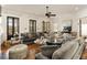 Spacious living room with plush seating, hardwood floors, and access to the porch at 18 Fernandina St, Mount Pleasant, SC 29464