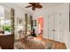 Cozy office space with a glass desk, plush rug, and ample natural light for a productive work environment at 18 Fernandina St, Mount Pleasant, SC 29464