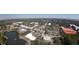 An aerial view of a commercial district with shops, offices, parking lots and lake at 1939 Oak Tree Ln, Mount Pleasant, SC 29464