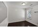 This bedroom features natural lighting and sleek wood flooring at 1939 Oak Tree Ln, Mount Pleasant, SC 29464