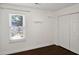 Bright bedroom with closet, shelving, and window at 1939 Oak Tree Ln, Mount Pleasant, SC 29464