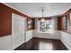 Inviting dining room with wainscoting, chandelier, and hardwood floors at 1939 Oak Tree Ln, Mount Pleasant, SC 29464