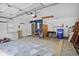 Spacious and organized garage area with ample storage and lighting at 1939 Oak Tree Ln, Mount Pleasant, SC 29464