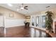 Bright living room with hardwood floors, french doors, fireplace and neutral decor at 1939 Oak Tree Ln, Mount Pleasant, SC 29464