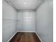 Spacious walk-in closet featuring ample shelving and wood flooring at 1939 Oak Tree Ln, Mount Pleasant, SC 29464