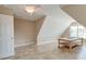 Spacious attic with tile flooring, vaulted ceilings, natural light and a ceiling fan at 195 Highwoods Plantation Ave, Summerville, SC 29485