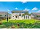 Large backyard perfect for entertaining with green grass and privacy fence at 195 Highwoods Plantation Ave, Summerville, SC 29485