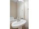 Pedestal sink bathroom features a modern faucet and a large mirror at 195 Highwoods Plantation Ave, Summerville, SC 29485