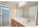 Bathroom with large mirror, white countertop, wood vanity and shower/tub at 195 Highwoods Plantation Ave, Summerville, SC 29485