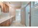Bathroom featuring double sink, wood cabinets, tile flooring and glass enclosed shower at 195 Highwoods Plantation Ave, Summerville, SC 29485