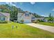Charming two-story home with a well-manicured lawn and inviting curb appeal at 195 Highwoods Plantation Ave, Summerville, SC 29485